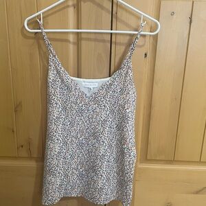 Socialite white scalloped tank top with multi color dots.